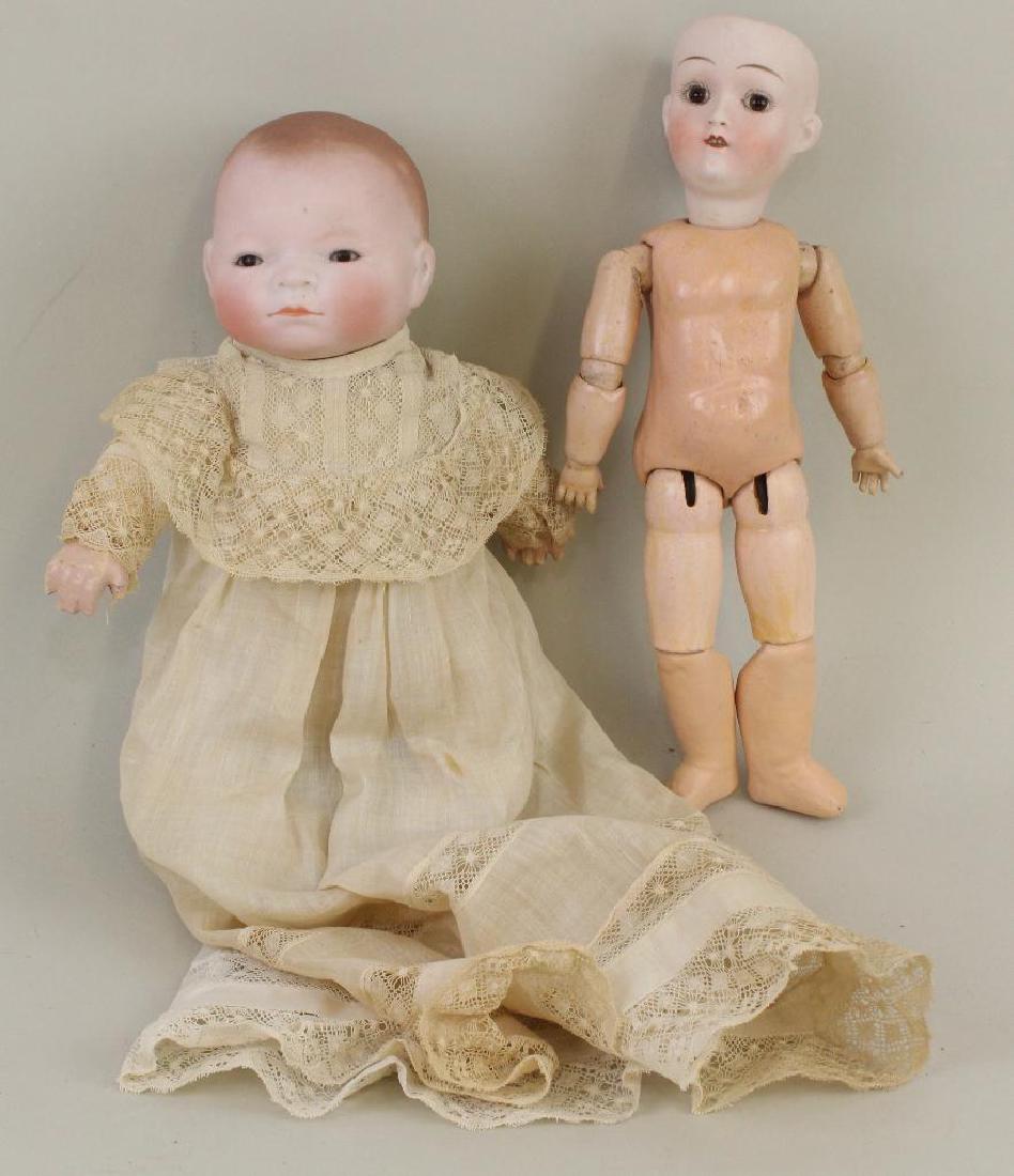 PAIR OF ANTIQUE BISQUE HEAD DOLLS. (1 of 3)