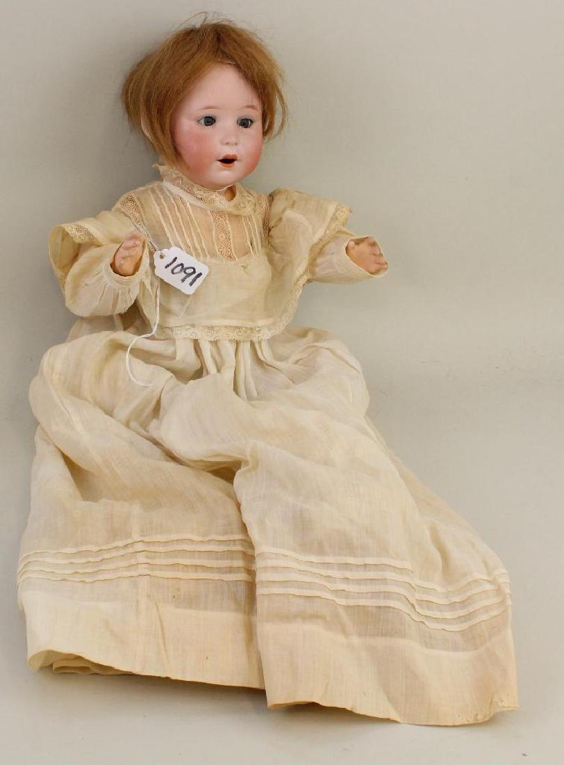 ANTIQUE BISQUE HEAD DOLL - 15" 40 1/2 JUTTA 1914 9 1/2: Blue sleep eyes, open mouth, human hair wig. 5 Pc. papier mache bent limb baby body. Dressed in long antique christening gown, petticoat. Condition: both teeth missing otherwise nothing observed on bi