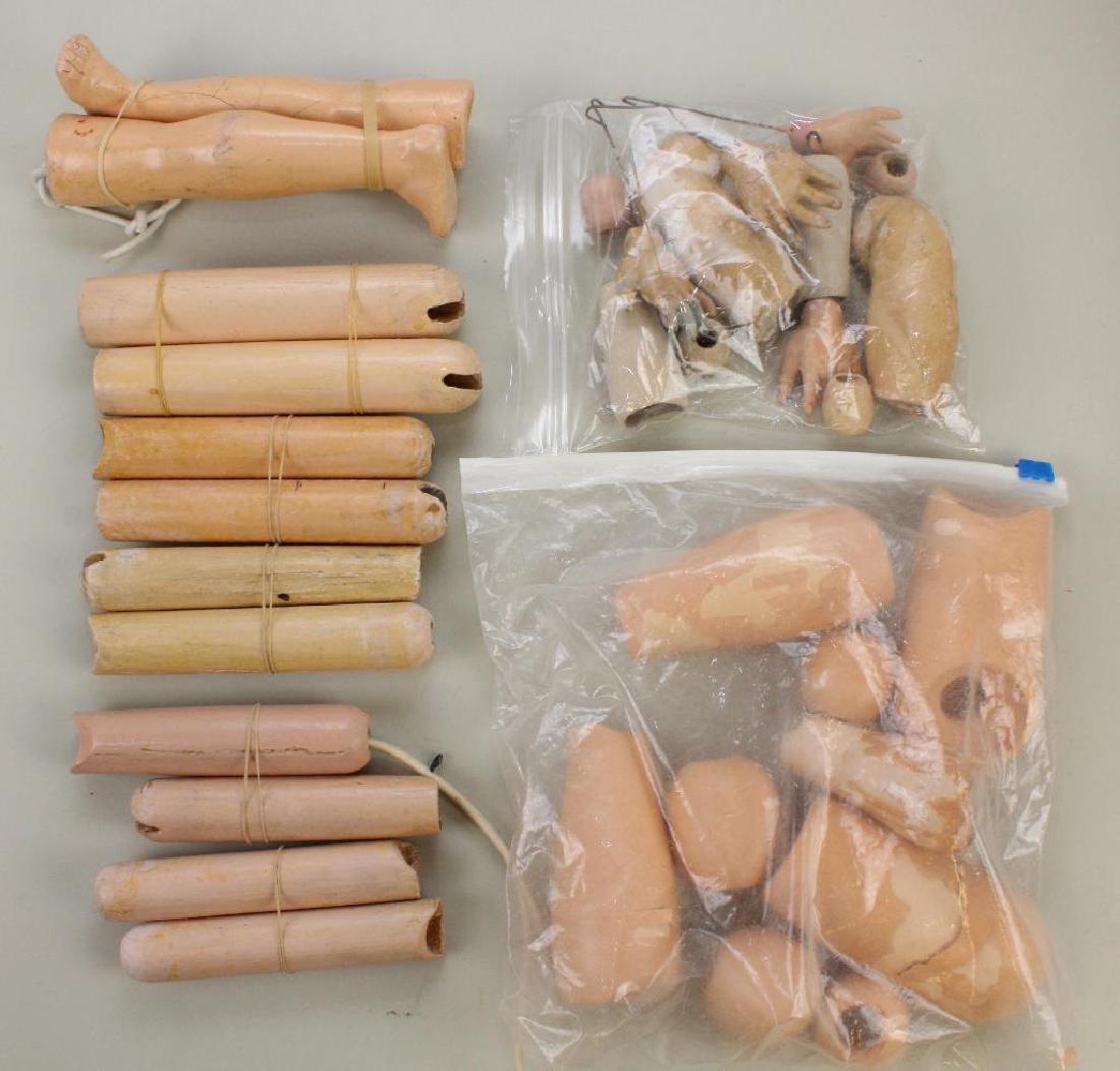 BODY PARTS - LOT OF PAPIER MACHE & WOOD PARTS FOR: Papier mache - pair of 7" lower flapper style legs. Set - (2) 10" arms without hands, lower arm, (4) balls. Set - (2) 8" arms with hands, (4) balls, (2) extra hands. Wood - (5) pairs of upper legs 5"-