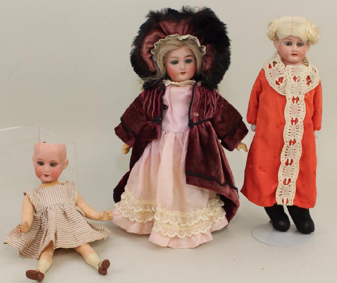 LOT OF (3) ANTIQUE BISQUE HEAD DOLLS. (1 of 4)