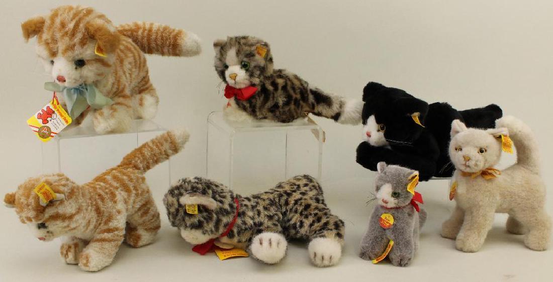 LOT OF (7) TAGGED STEIFF PLUSH CATS. (1 of 4)