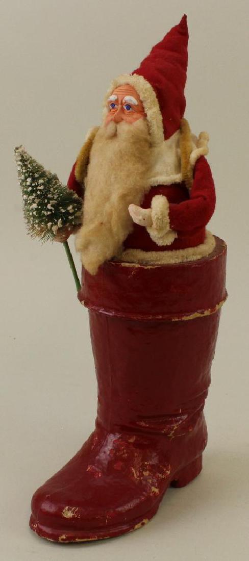 14" ANTIQUE PAPIER MACHE SANTA IN BOOT. (1 of 1)