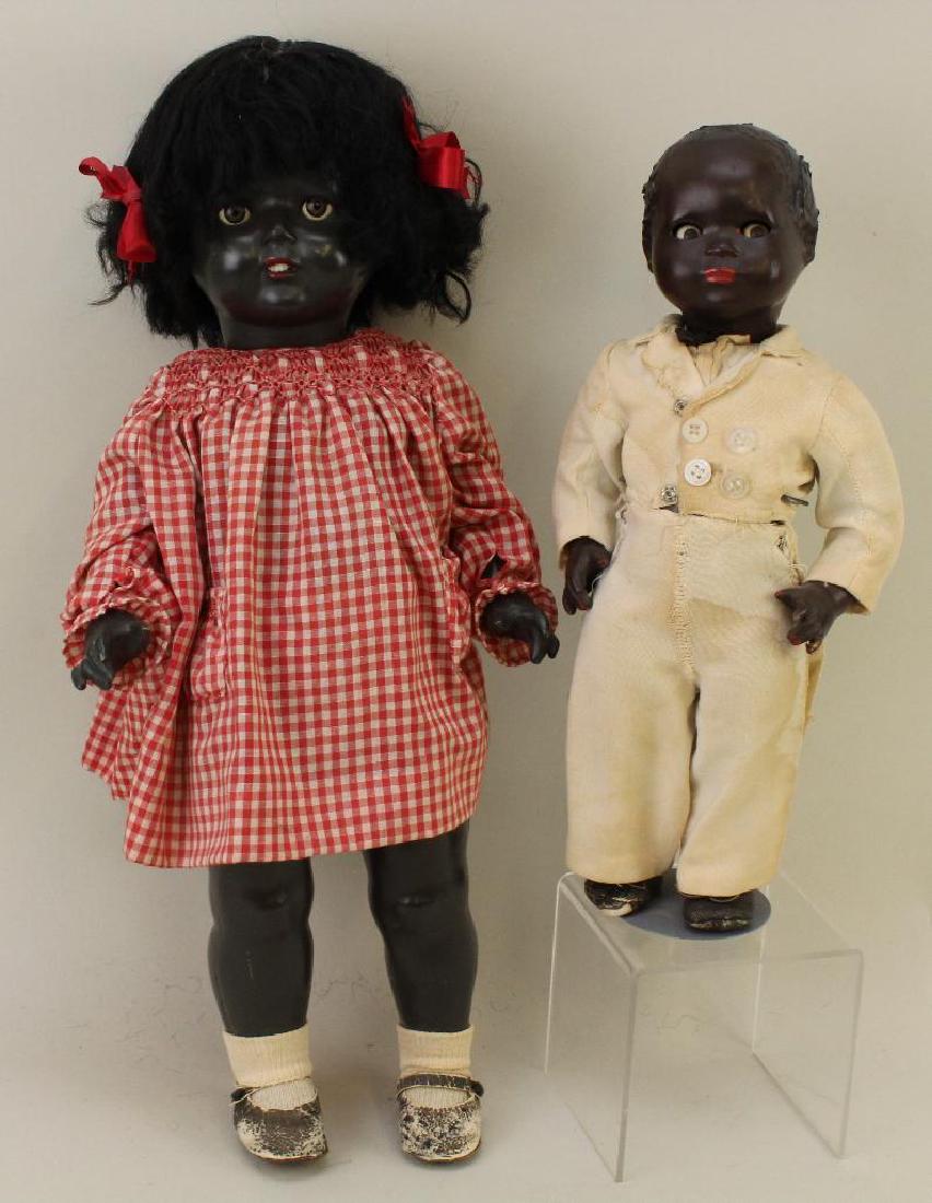 PAIR OF UNMARKED COMPOSITION BLACK DOLLS. (1 of 4)