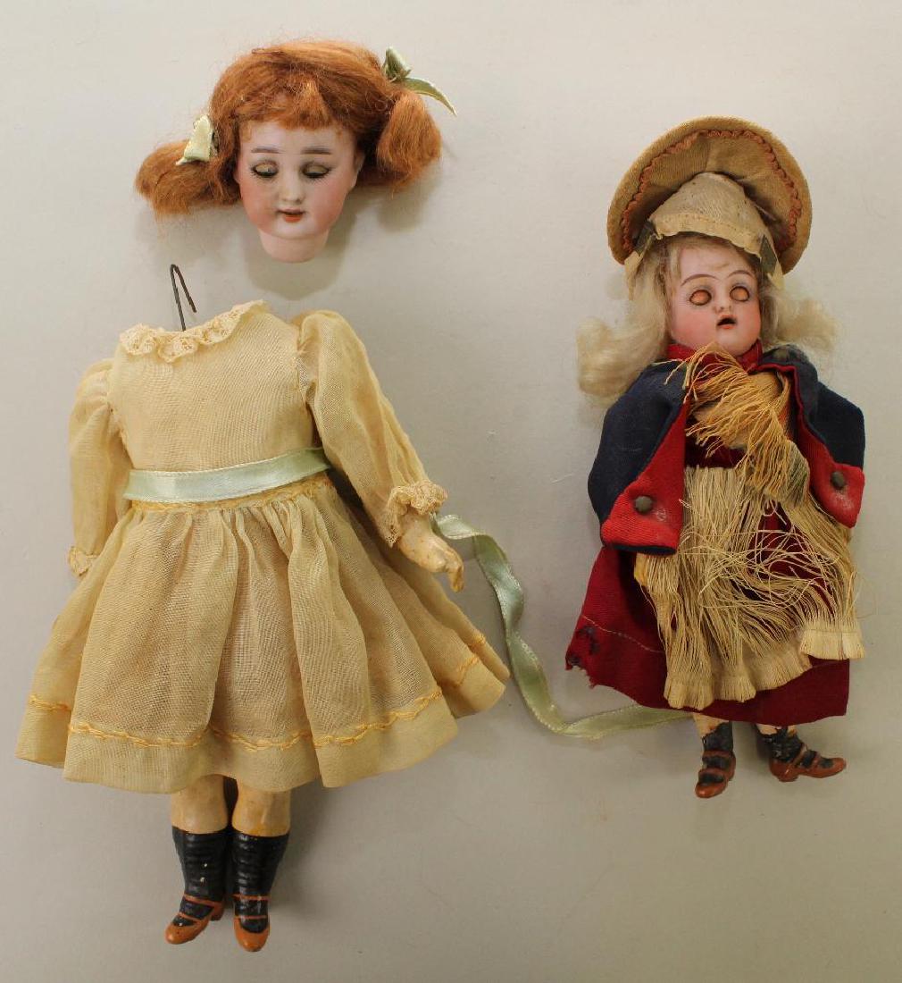 PAIR OF GERMAN ANTIQUE BISQUE HEAD DOLLS. (1 of 4)