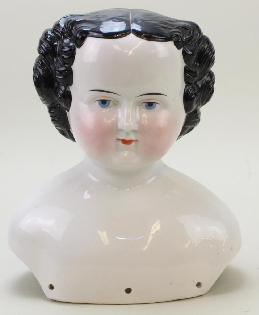 9 1/2" UNMARKED ANTIQUE CHINA SHOULDER HEAD. (1 of 2)