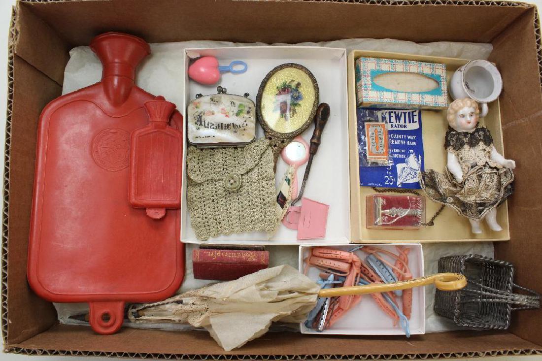 LOT OF VINTAGE/ANTIQUE ACCESSORIES, DOLLS.: Accessories - Child's CREST rubber hot water bottle. Doll's rubber hot water bottle. Child's hand mirror with needlepoint back. Ginny mirror. Doll's shell pocketbook (missing handle) and others. Ladie