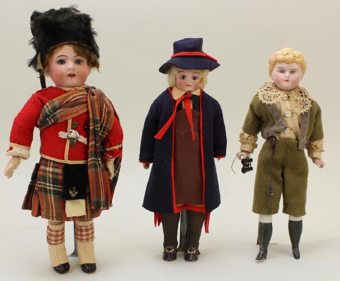 LOT OF (3) ANTIQUE BISQUE HEAD MALE DOLLS. (1 of 6)