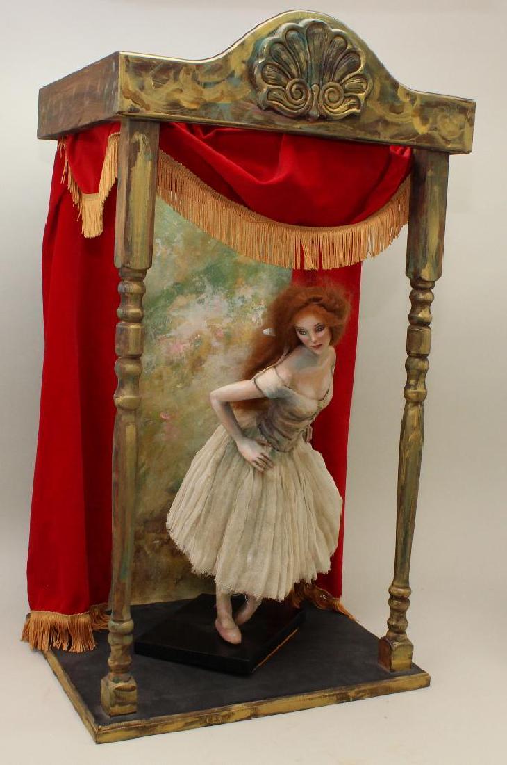 Nancy Wiley 1997 "BALLERINA IN REPOSE", HAND PAINTED: LE #4/25. This 18" Ballerina is signed on the back. She is sculpted and hand painted with red mohair wig. She has a molded bodice with gauze/tulle skirt. Stage is 31" T x 17" W x 13 1/2" D. It has a h