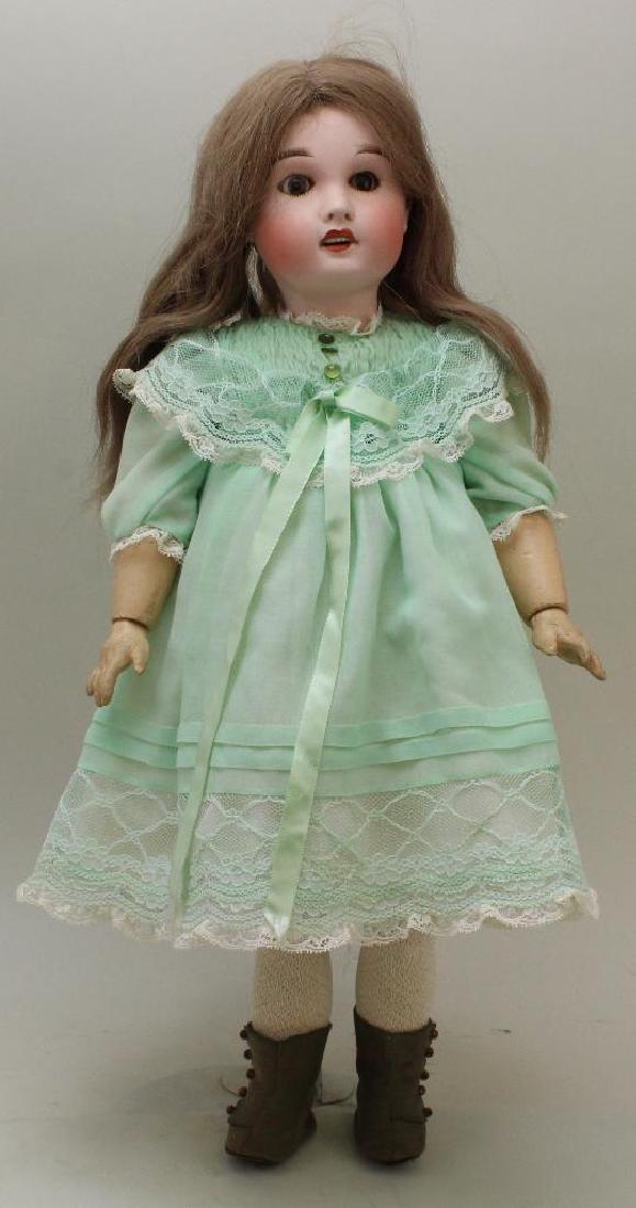 21 1/2" FABRICATION FRANCAISE AL, CIE LIMOGE CHERIE 8: Lanternier child. Brown sleep eyes, open mouth, pierced ears, brown human hair wig. Papier mache ball jointed body. Dressed in newer dress, petticoat, socks, leather boots. Vintage pantaloons. Conditi