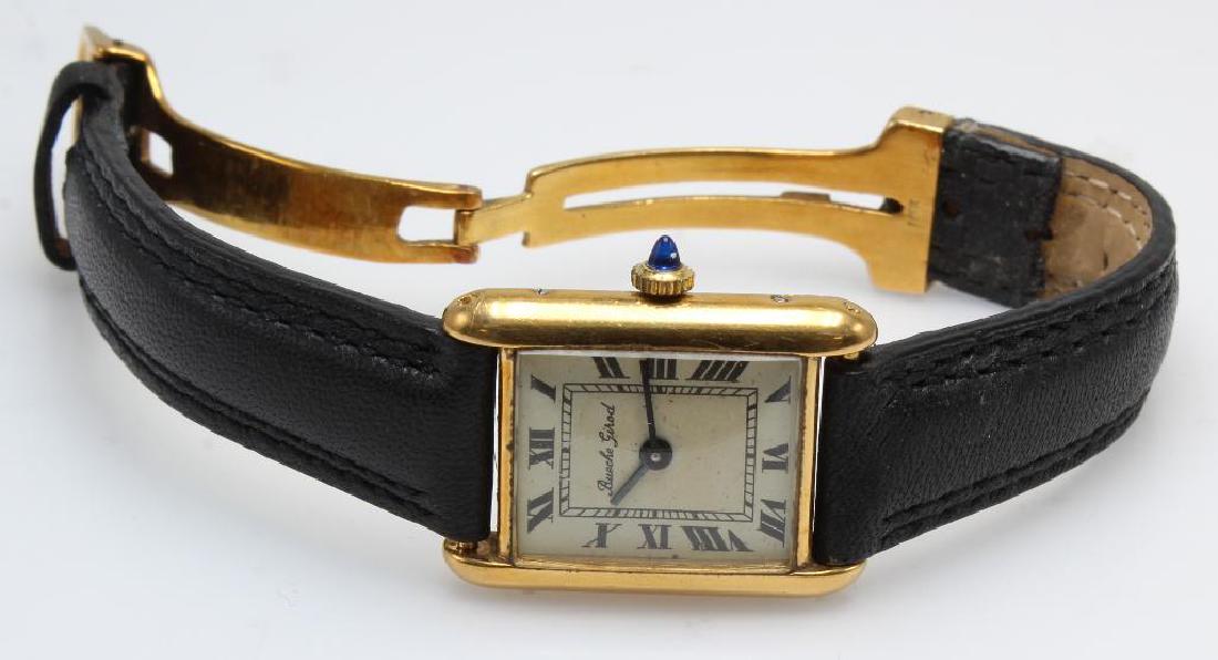 Bueche Girod Wrist Watch. 18K Yellow Gold Tank Style.: 27.4mm lug end to lug end. Approx. 1 3/4" I.D. or 6" long. Gilden black genuine Leather band with 18KY deployment buckle appears new. 27.7gtw.