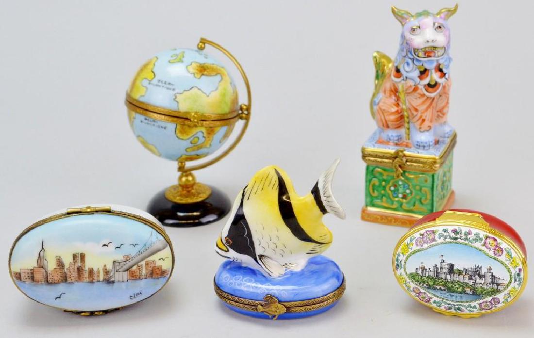 French Limoges Trinket Box Grouping: Rochard French Limoges Foo Lion 4"h x 1.5"w, Peint Main globe 3.25"h x 2.5"w, Peint Main Marques Deposee Coralfish 2.5"h x 2.25"w, NY City 1.25"h x 2.25"w, Halcyon Windsor Castle 1.25"h x 2.25"