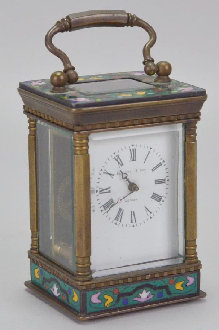 Elliot & Sons Enameled Carriage Clock: Painted porcelain face with Roman numerals, beveled glass panels on all sides. Green cloisonne decoration. Includes key. 3.25"h x 2.25"w x 2"d