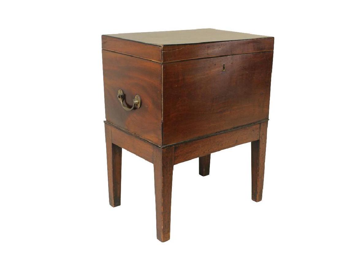 Cellerette: Walnut case with divided interior on stand. 19"h x 14.75"w x 10"d