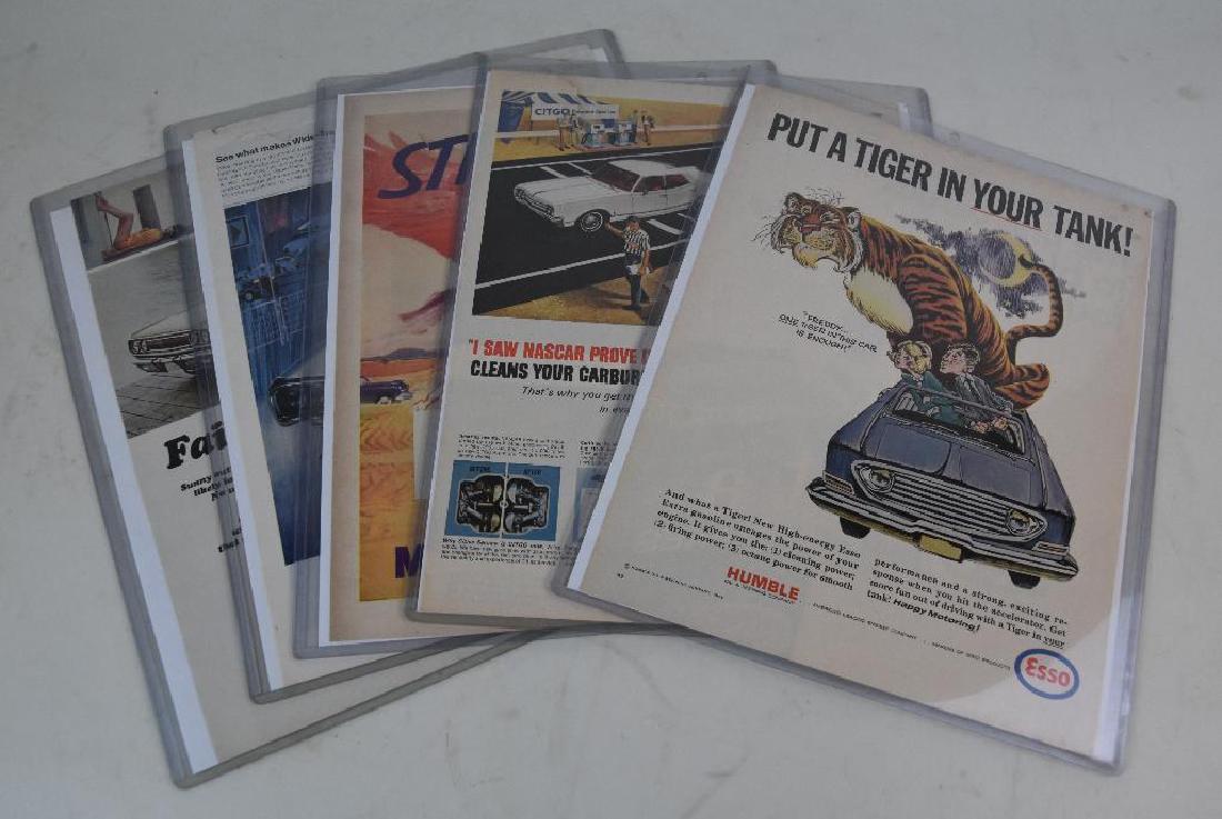 Petroliana ad lot: Esso, Citgo, Mobilgas, GM, and Chrysler ads.