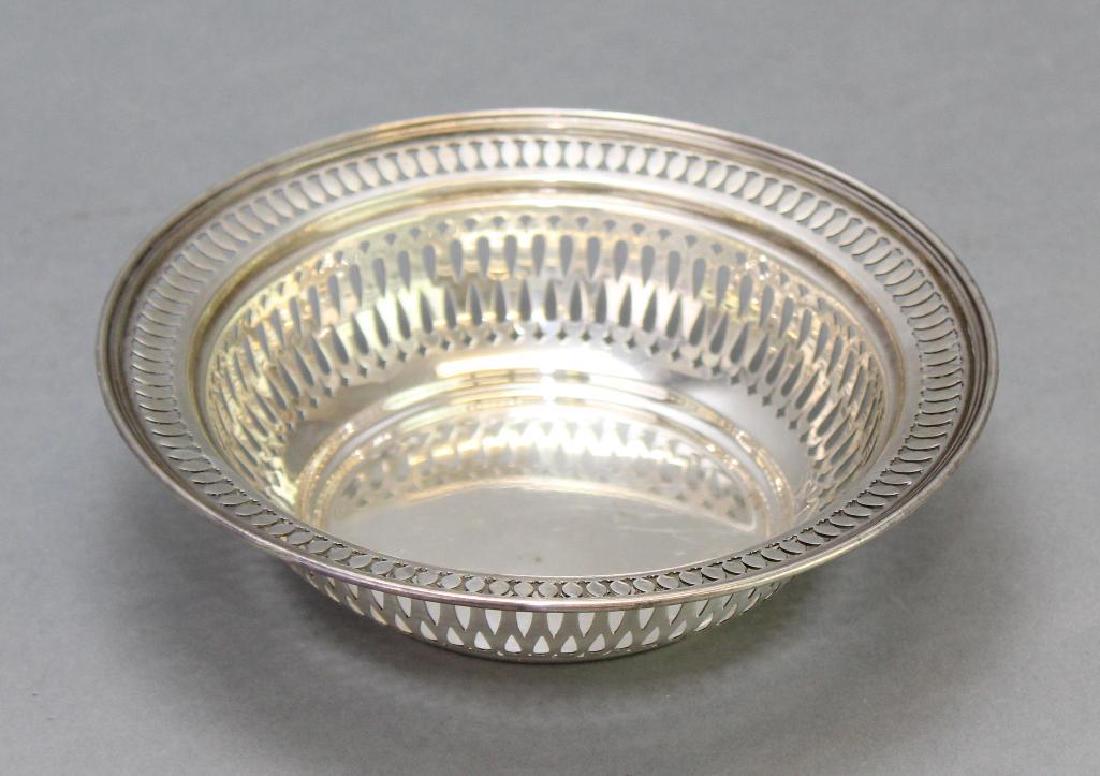 Tiffany & Co Reticulated Sterling Silver Bowl: Hallmarked Tiffany & Co., 18187A. Makers 7706 Sterling Silver 925-1000 M [for John C. Moore II, 1907-1947] 1.75"h x 6.25"round. 4.4ozt
