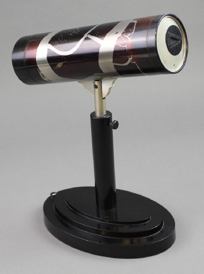 Willie & Alice Stevenson Kaleidoscope: Different colored aluminum telescope on black metal base. Polyangular/Alpha series. C13 by Spirit Scopes (Willie & Alice Stevenson). 1988. H14"