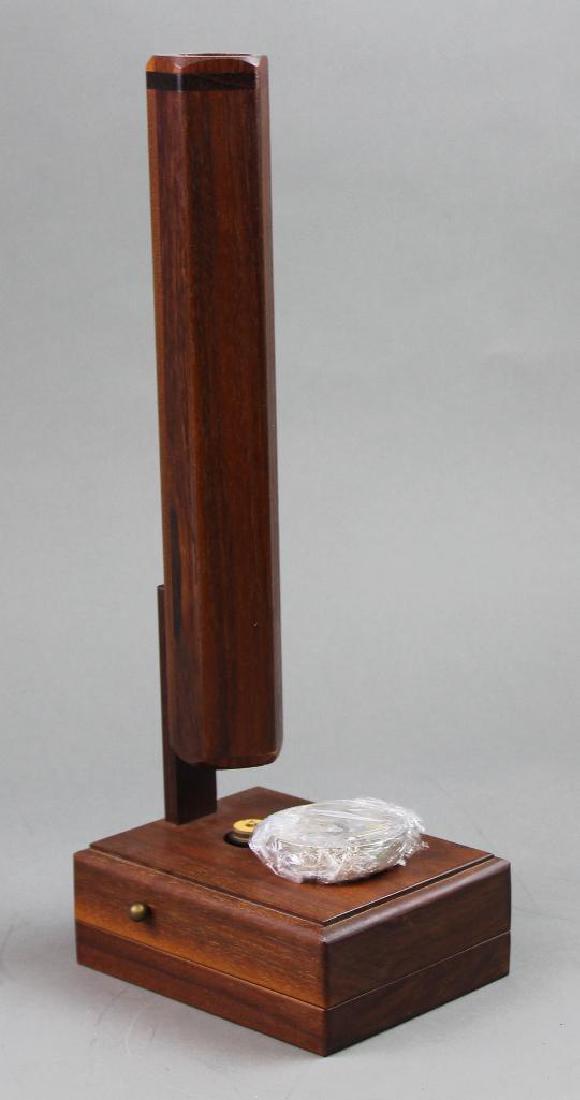 Ron Lee Kaleidoscope: Wood Pentagon Cylinder Look-Down with Music Box and revolving open disc. 14" high. Ron Lee