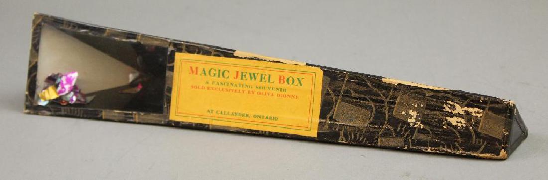 Oliva Dionne Kaleidoscope, "Magic Jewel Box": Black and gold Paper Covered Cardboard Triangular Shape, 12". "Magic Jewel Box", Oliva Dionne, Callander, Ontario