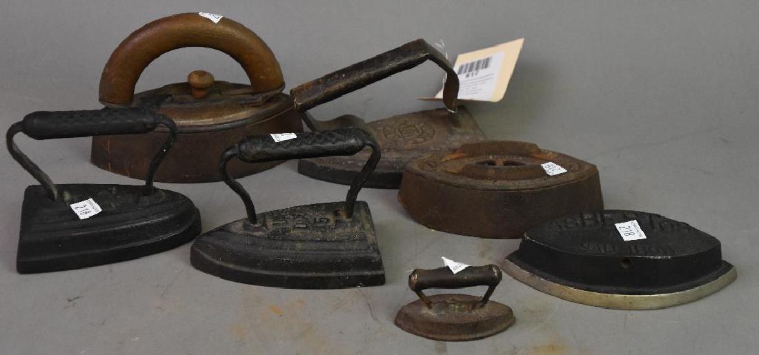 Seven Sad Irons: Largest 7"w x 4"d x 5"h.