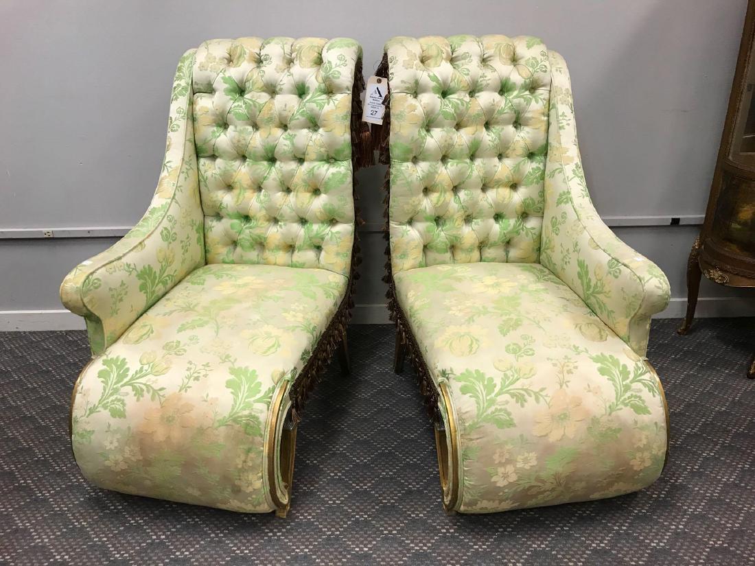 Pair of Upholstered Chaise Lounges: Left and right chaise lounges with tufted upholstery and tassel trim on gold/silver painted legs. 42" x 32" 21 1/2"