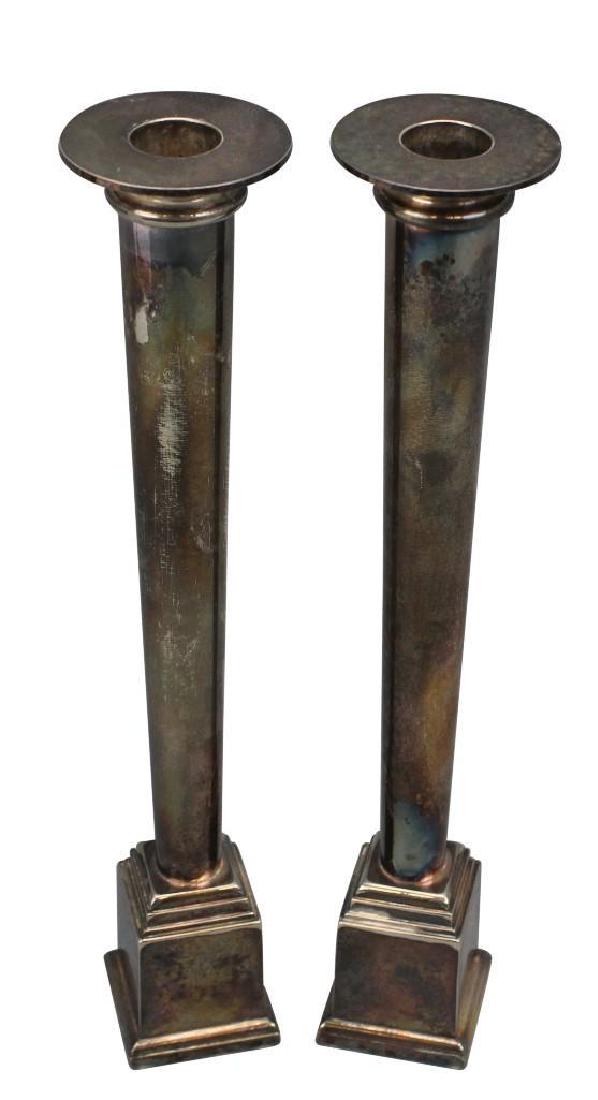 Swid Powell Candlesticks: Italy, 20th c. Silver plate 12"h Designed by architect Robert Stern, hallmarked Swid Powell, "M"