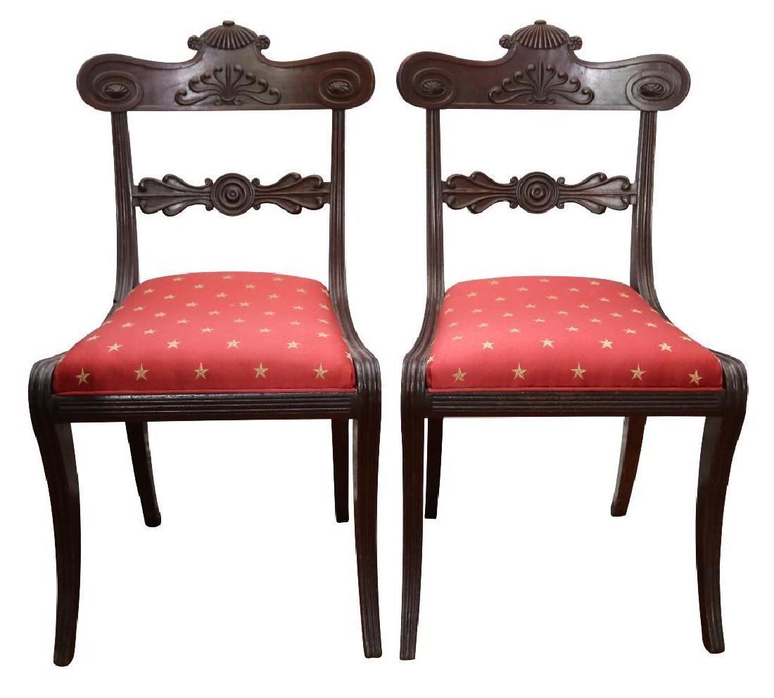Pair of Mahogany Side Chairs: English, 19th c. Mahogany 35" H x 19" W x 17 1/2" D Pair of mahogany side chairs, incised and carved back splat with shell carving to top, upholstered seats lift off to caned seats
