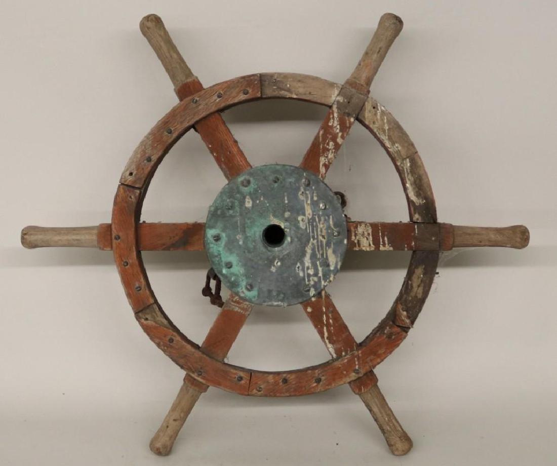 Small Ship's Helm: Wood helms wheel measuring 24" diameter x 6"h.