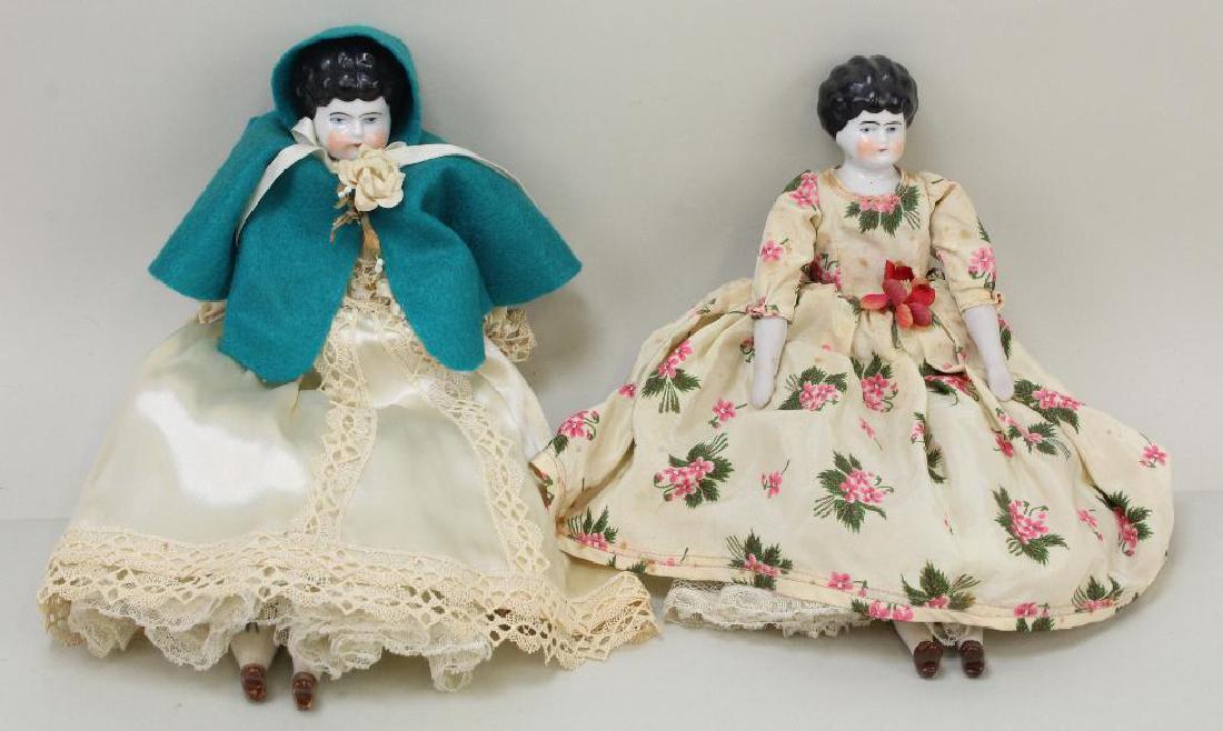 PAIR OF ANTIQUE CHINA HEAD DOLLS. (1 of 2)
