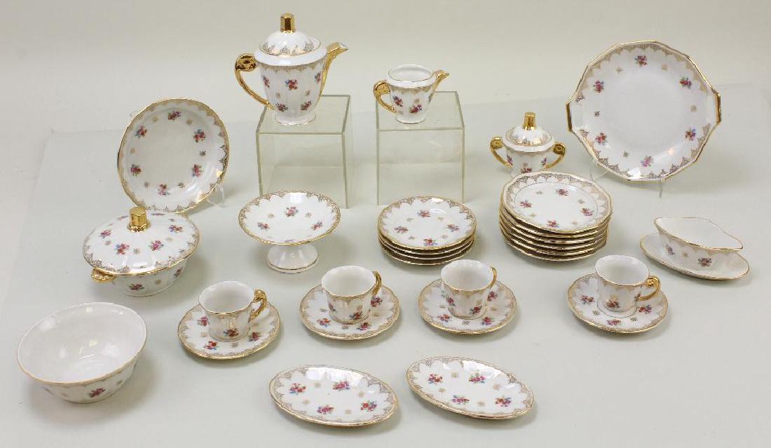 CHILD'S FRENCH PAINTED CHINA TEA SET. (1 of 3)