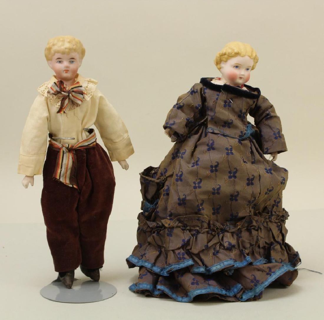 PAIR OF ANTIQUE GERMAN BISQUE SHOULDER HEAD DOLLS. (1 of 5)