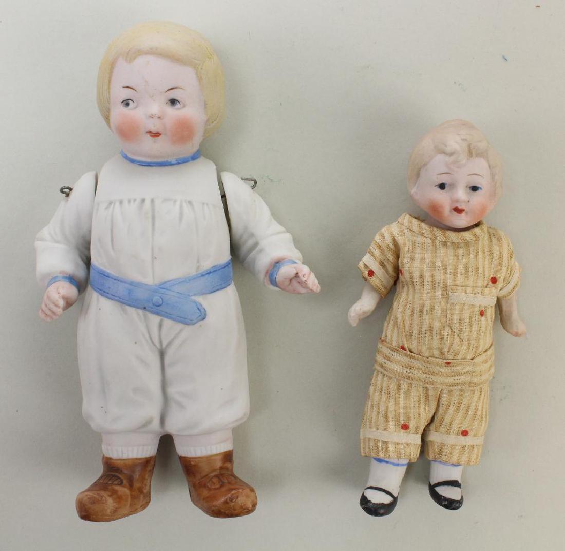 PAIR OF ANTIQUE ALL BISQUE BOY DOLLS. (1 of 3)