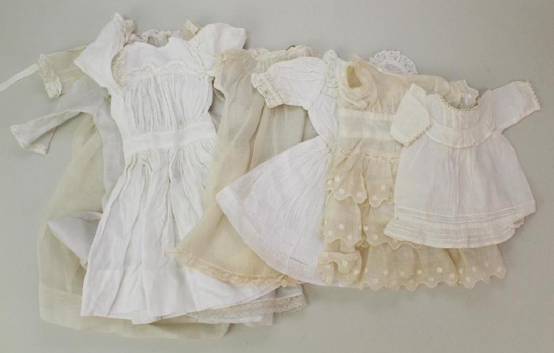 LOT OF ANTIQUE DOLL CLOTHING - DRESSES. (1 of 3)