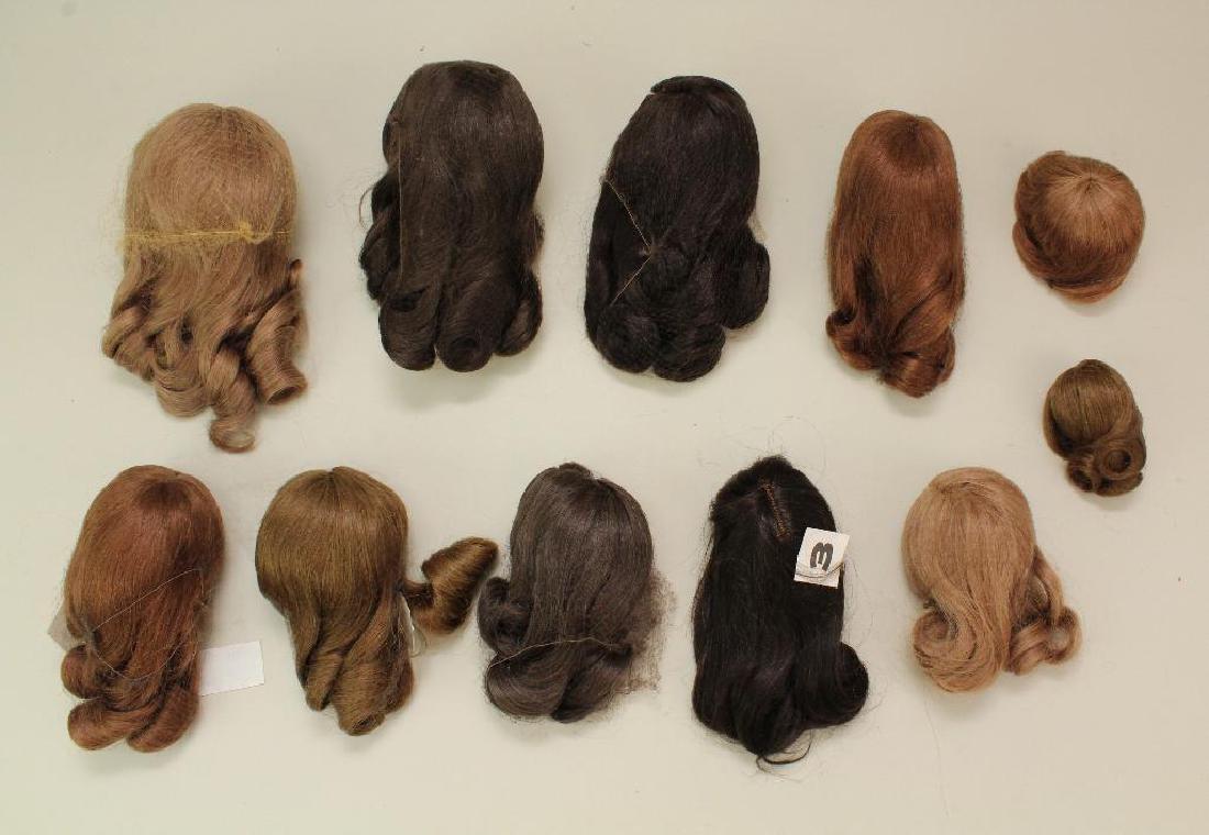 LOT OF (11) NEW FRENCH HUMAN HAIR DOLL WIGS. (1 of 1)