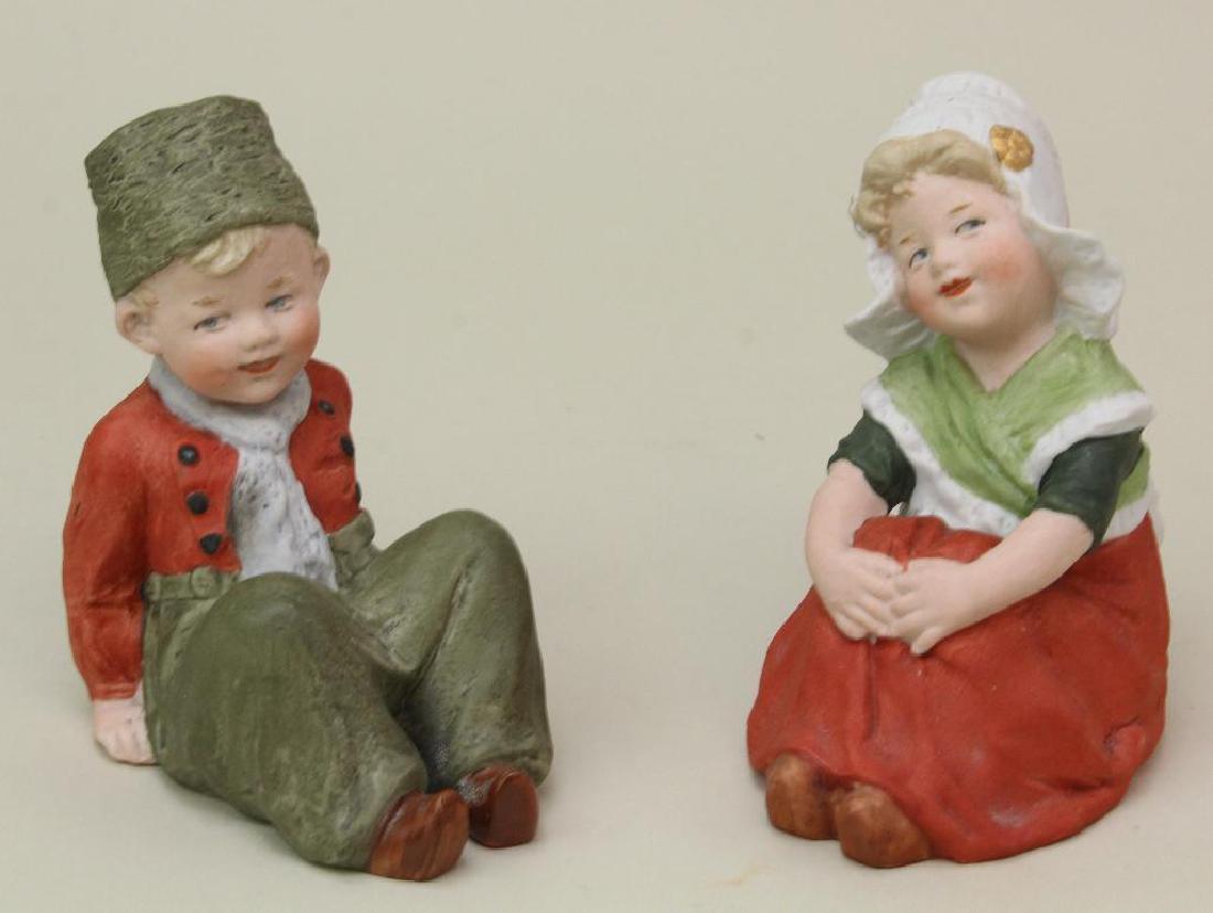 PAIR OF ANTIQUE HEUBACH DUTCH FIGURINES. (1 of 2)
