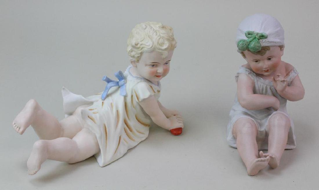 PAIR OF ANTIQUE PIANO BABY FIGURINES. (1 of 3)