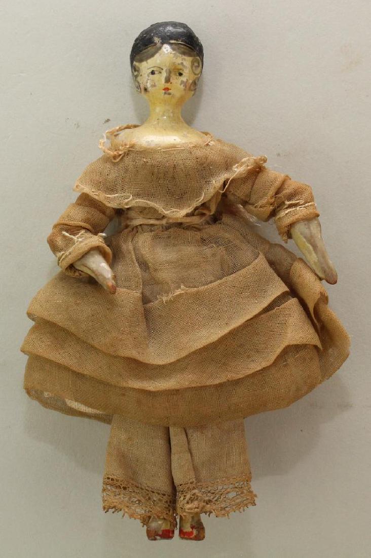 4 1/4" MID 19th C. PEG WOODEN DOLL. (1 of 3)