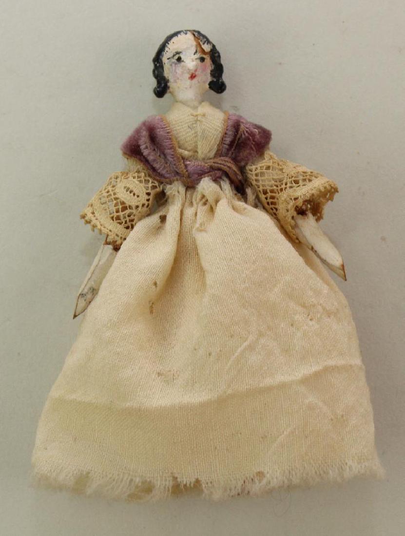 3 1/4" MID 19th C. PEG WOODEN DOLL. (1 of 3)