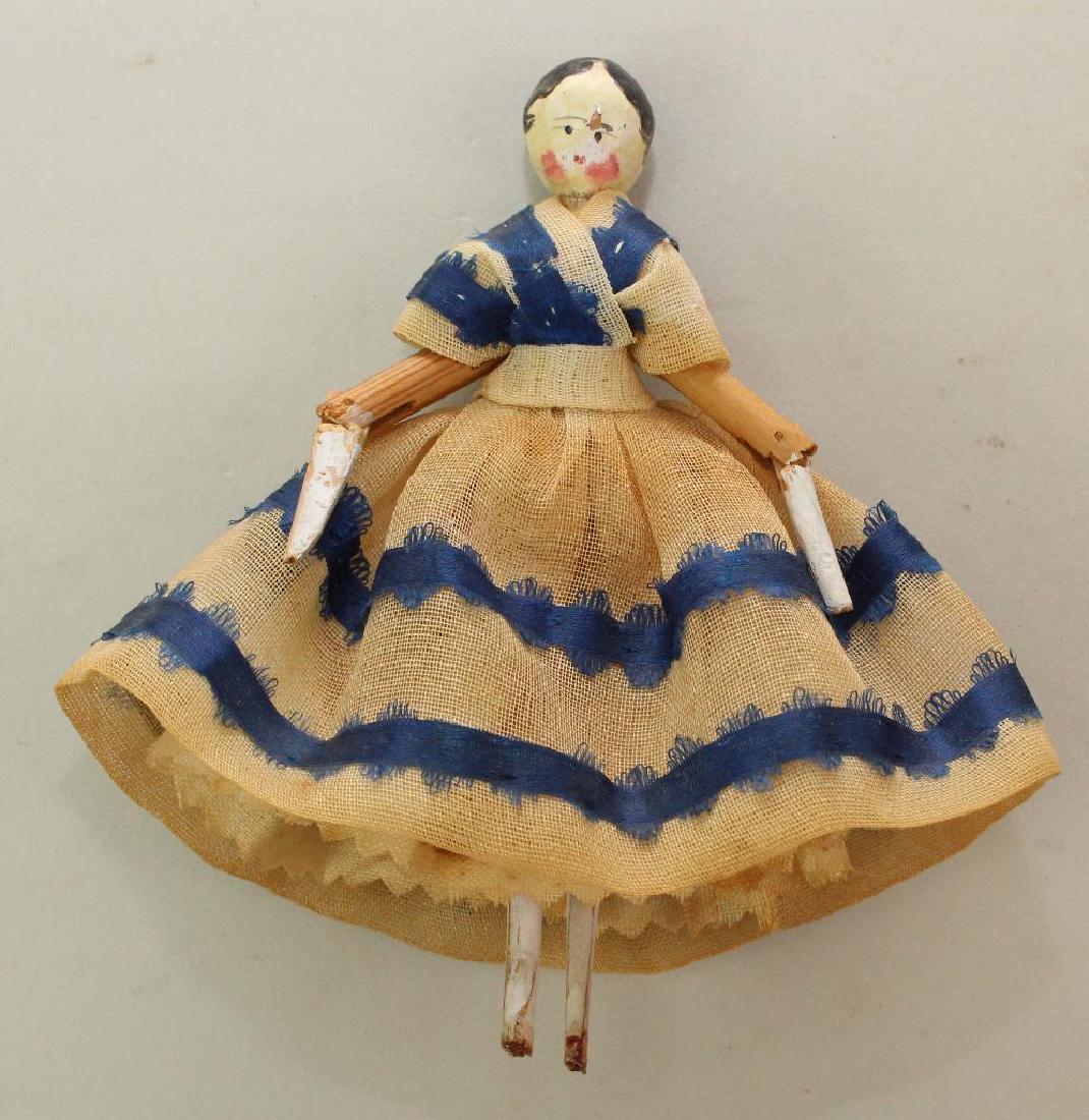 4 1/4" LATE 19th C PEG WOODEN DOLL. (1 of 3)