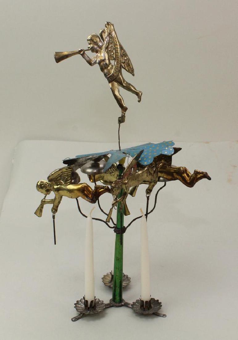HOLIDAY/NOVELTY: ANTIQUE TIN CANDLE-BELL ANGELS CHIMES.: Possibly late 19th-early 20th C. Overall height: 14 1/2" . Three candles on bottom, tin whirligig on top with the angels underneath striking the bells. Angel on top reads: EHRE SEI GOTT IN DEP HOHE. C