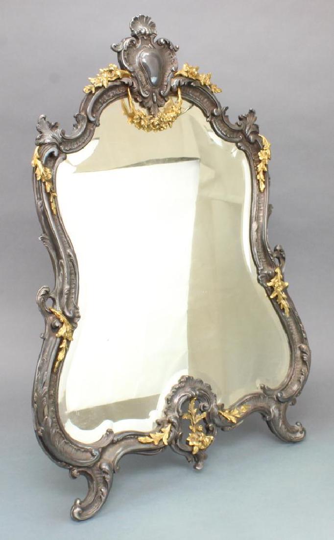 French Silver and Ormolu Mirror: Victorian, die stamped, with ormolu festoons. 28"H x 20"W