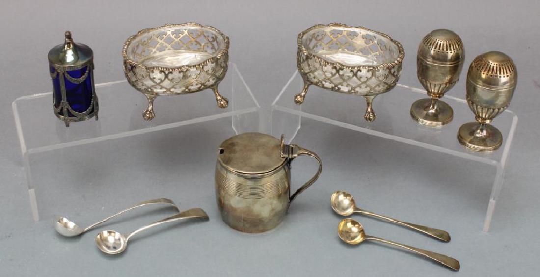 Georgian Sterling Silver Entertainment Grouping: 1789 George III mustard pot and spoon; 1802 John Eames London salt and pepper dated; 1770 (2) master salts by David and Robert Hennell; (4) salt spoons of varying dates and maker. Also includes Swedis