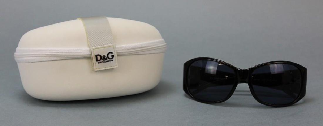 Dolce and Gabbana Womens Sunglasses: Dolce and Gabbana women's sunglasses, black with case. 6.5"H x 5.5"W