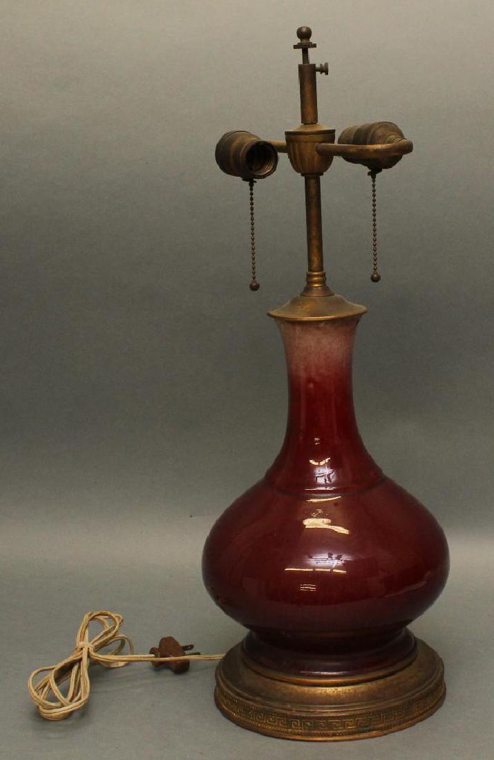 Sang de Boeuf Lamp: Chinese ox blood or sang de boeuf vase converted into a lamp. 23.5"H x 8.5"W
