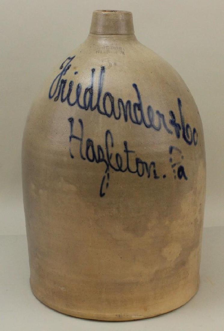 Blue Decorated Stoneware Jug: American, 19th c. James Ryan, Pittston, PA. Blue decorated signature, size, and script decoration, "Friedlander & Co Hazleton, PA". 5 gallon. 18" H x 11.5" W