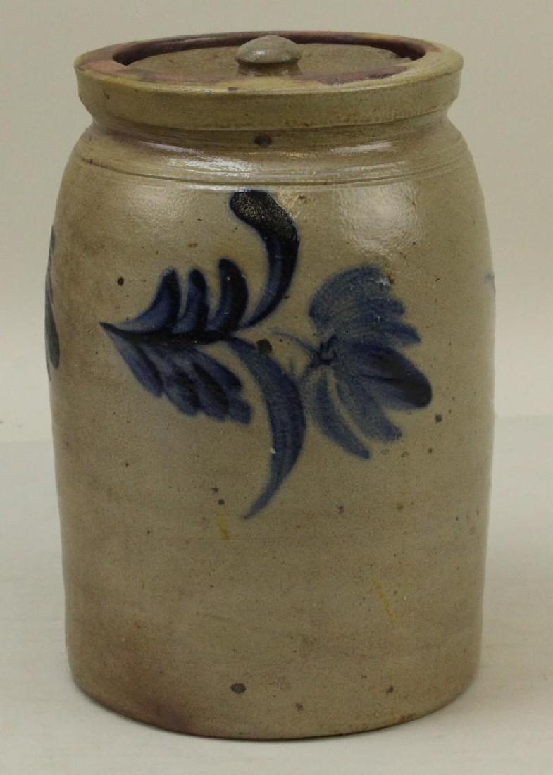 Blue Script Decorated Stoneware Crock: American - 19th/20th C. Floral design front & reverse. 9"H x 5.75"W