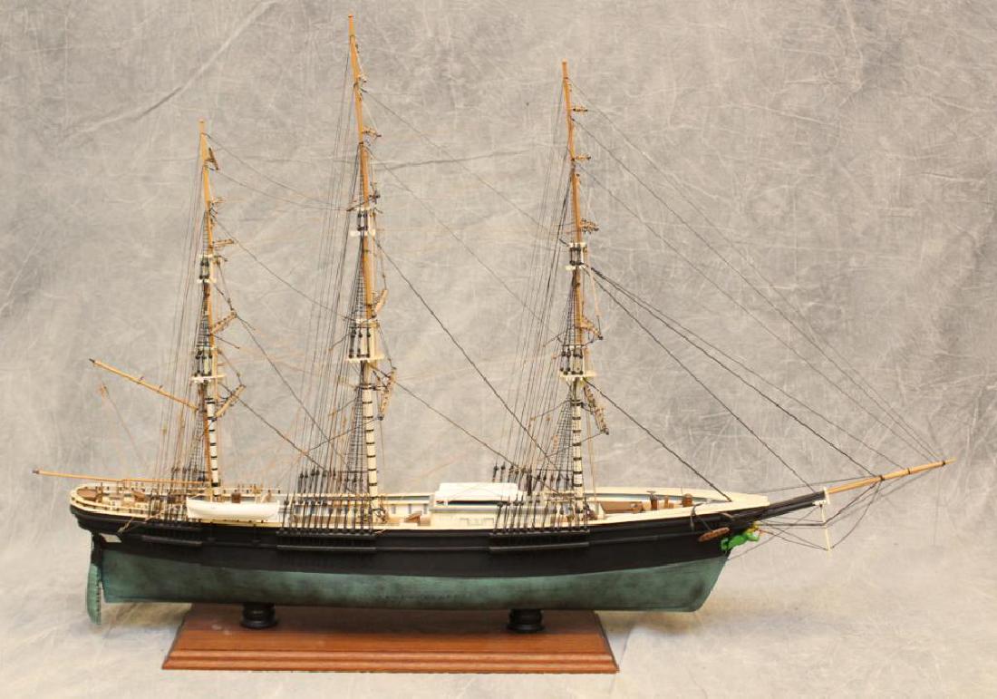 "Flying Cloud" Model Ship: Wooden ship model of the American 19th century, 3-masted clipper sailing ship the "Flying Cloud". Ship displays full rigging and no sails and measures 24" (H) x 37" (L) x 8" (W). The model was scratch