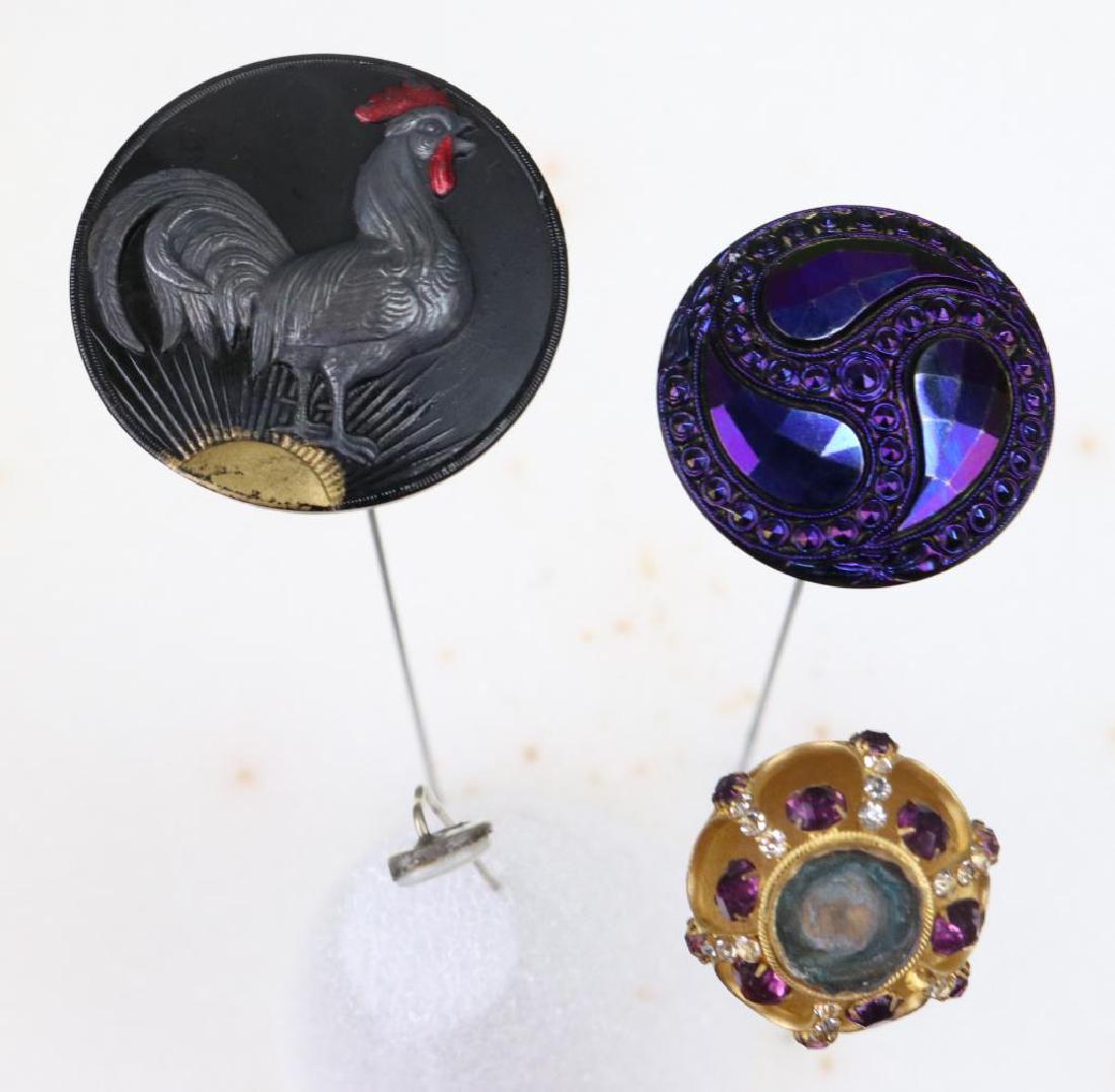 Hat Pin Grouping: Sterling with white stone, 3"H Rhinestone with purple stone, Purple whirling leaves, 10" Suns up painted with rooster, 11"