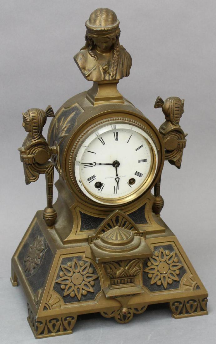 Mitchell Vance Egyptian Revival Clock: Spelter clock, Mitchell Vance & Co N.Y. on the porcelain enamel dial, time and strike. 15"H x 8.75"W x 6"D