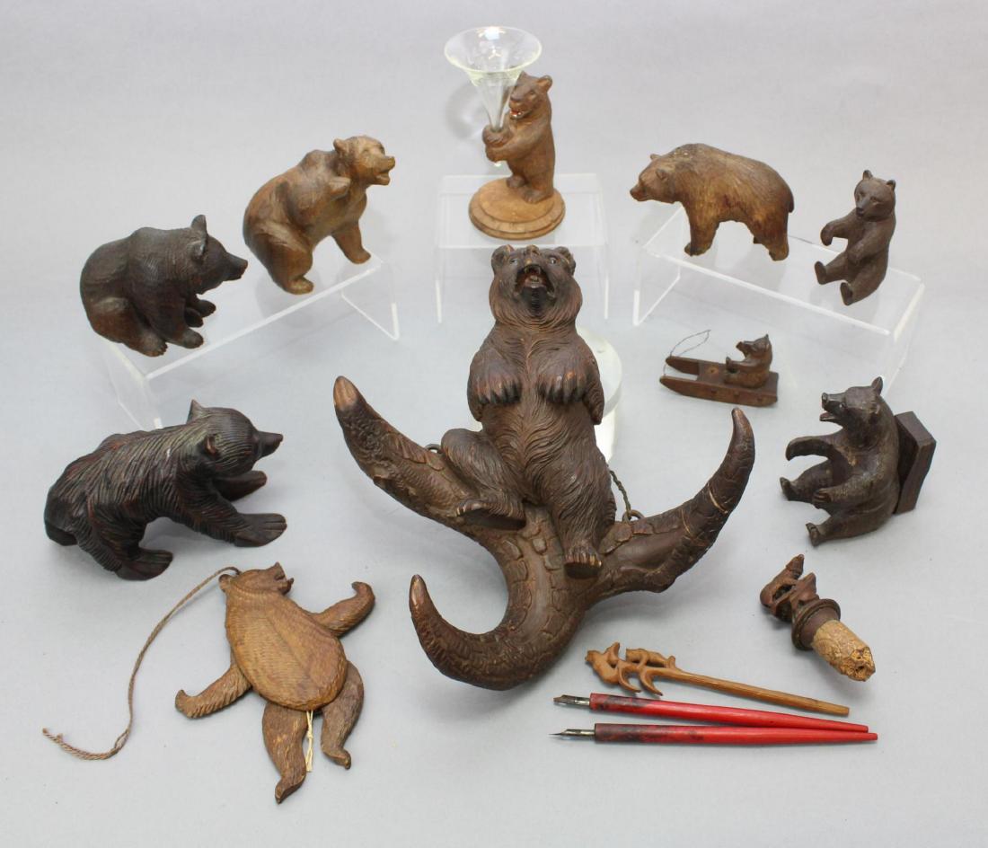 Black Forest Carving Grouping: (12) Figures including traditionally carved walking and sitting bears, wine stopper, bud vase, jumping jack, hat rack with repair. Largest 11"H x 9"W