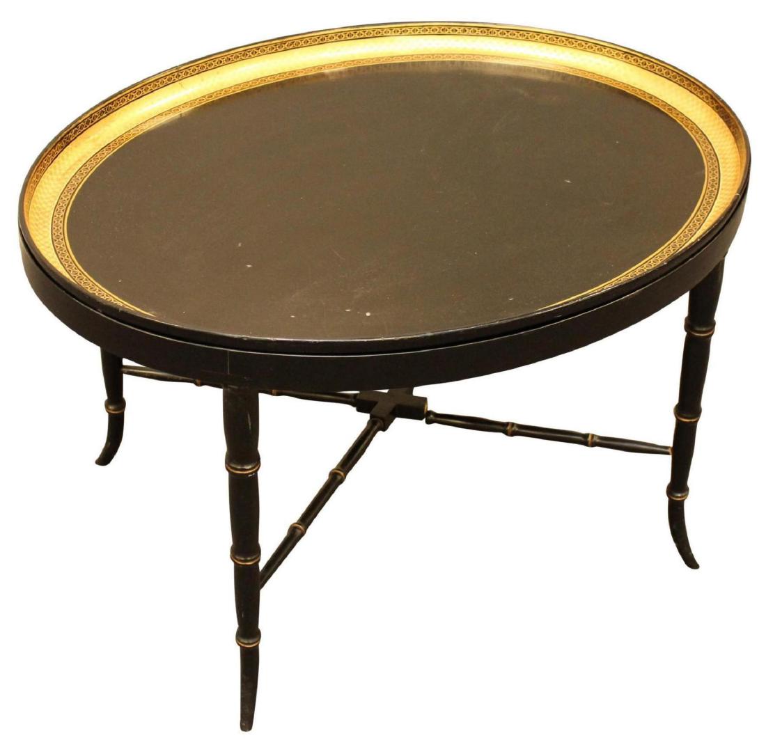 Papier Mache Tray on Stand: Oval tray, black with fine gilt decoration, confirming base with bamboo turnings. 19"H x 29.5"W x 23"D